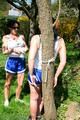 Jill tied and gagged by her friend in shiny nylon shorts