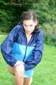 Enni wearing sexy blue shiny nylon shorts and rainjacket during her warm-up (Pics)