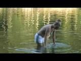 Jenny swimming in the sea wearing sexy shiny nylon shorts and a bikini top (Video)