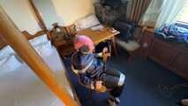 Rachel Adams bound, pantygagged and pantyhooded in shiny nylon Rainwear