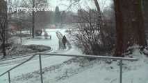 020167 Kathy Pees From A Staircase In The Snow