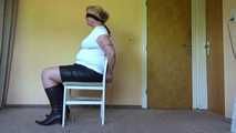 Cuffed on a chair 002