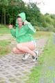 Enni having a good time outdoor wearing sexy shiny nylon shorts and a top posing for the camera (Pics)