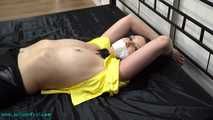 Nina heavyly cuffed to the bed