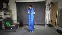 Myxxxy bound and gagged in a shiny nylon Skisuit