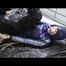 0345 min video with Jill tied and gagged in black/blue shiny nylon rainwear in bed
