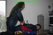 Get 548 Pictures with Jill tied and gagged in shiny nylon rainwear from 2005-2008!
