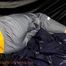 Samanthy bound and gagged in shiny nylon rainwear