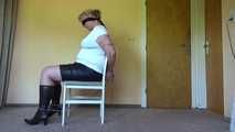 Cuffed on a chair 002