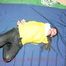 Jill tied and gagged on bed wearing a sexy black shiny nylon rain pants and a yellow and a white shiny nylon rain jacket (Pics)