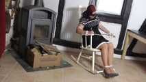 Aurora try to get free on chair 