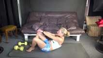 Watching sexy Sandra wearing a sexy lightblue shiny nylon shorts and a white top during her workout with barbells (Video)