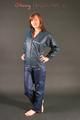 Alina posing in a studio wearing a supersexy darkblue rainwear combination (Pics)