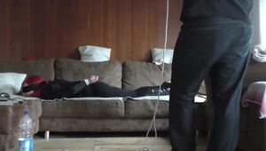 Angi hogtied on couch 1/2
