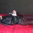 *** MODELL MIA*** being tied and gagged with ropes and a clothgag wearing a sexy brown shiny nylon pants and a black rain jacket (Video)