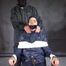 Aiyana in rainwear chairbound, gagged and hooded (and she loved it) Part2