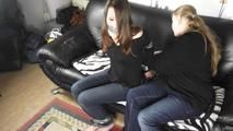 Isabelle taped on Sofa