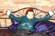 Mara tied and gagged on a princess bed in an old cellar wearing an supersexy shiny green down jacket and a rain pants (Pics)