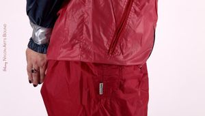 Shelly bound and gagged in shiny nylon rainwear