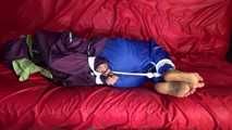 SANDRA being tied and gagged on a sofa with ropes and a clothgag wearing a sexy blue shiny nylon rain pants and a purple rain jacket  (Video)