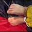 Get 2 Archivevideos with sonja enjoying Bondage in her shiny nylon Rainwear