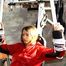 Katharina tied and gagged in shiny nylon rainwear