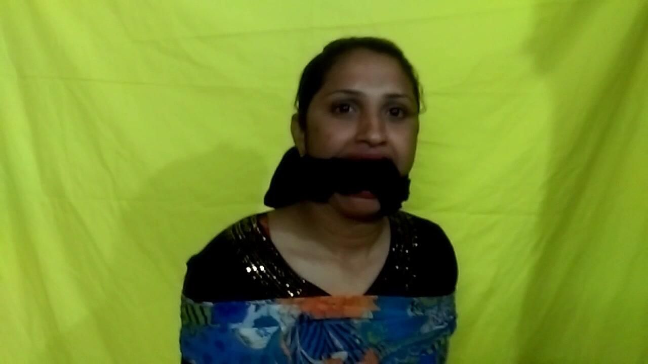 Cheri bound and gagged in borka