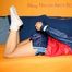 One of our archive girls tied and gagged in a shinynylon Rainjacket and shiny nylon shorts