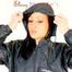 Stella posing sexy in a studio wearing sexy black shiny nylon rainwear and highheels (Pics)