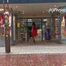 068013 Ling Pees In The Toyshop Doorway