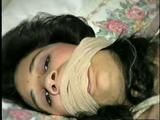 19 Yr OLD LATINA HOUSEWIFE WASHCLOTH MOUTH STUFFED, ACE BANDAGE WRAP GAGGED, BALL-GAGGED & HOG-TIED ON BED (D43-8)
