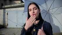 Attractive Lera taking a smoke break outside