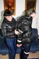 Petra was tied by Jill in shiny downjackets 