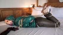 Rachel Adams tied and gagged in shiny Downwear