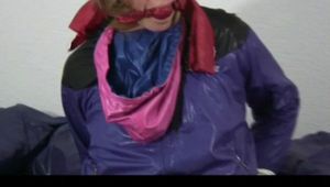 02:50 Min. video with Katharina tied and gagged in shiny nylon clothes