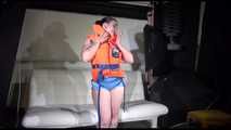 Sexy Jill shows you how to enjoy putting on and wear a lifevest over an bikini and a shiny nylon shorts (Video)