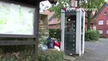 068008 Ling Floods A Phone Box With Pee