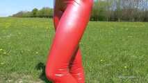 Red leggings on a green meadow