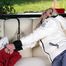 Nina bound in white downjacket and rainpants