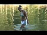 Jenny swimming in the sea wearing sexy shiny nylon shorts and a bikini top (Video)