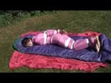 03:50 Min. video with Julia tied and gagged in a shiny pink skisuit
