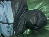 Two videos of our archive girls tied and gagged in shiny nylon rainwear