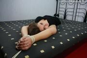 Laura lying on bed PICS