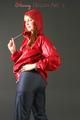 Anastasia posing in a foto studio wearing supersexy rainwear (Pics)