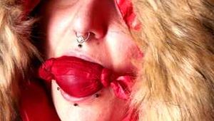 Mara wearing a sexy black shiny nylon down pants and a brandnew red special down jacket tied and gagged overhead with ropes (Pics)