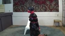 Ana in shiny raincoat bondage