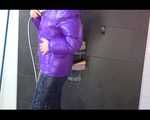 Get an Archive Video with Mara enjoying a shower with her shiny nylon downjacket