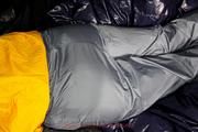 Samanthy bound and gagged in shiny nylon rainwear