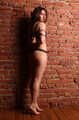 Barefoot Gwen in bra and panties, hogtied on the floor