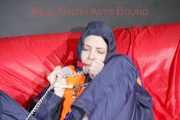 *** HOT HOT HOT*** NEW MODELL*** DESTINY wearing a sexy blue/red shiny nylon rain suit and a life jacket ties and gagges herself with cuffs on a sofa (Pics)